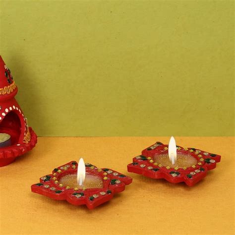 Buy Utsav Swastik- Set Of 2 from Home Centre at just INR 129.0