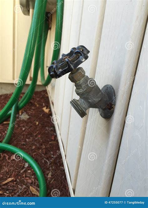 Outdoor Garden Faucet, Hose Stock Image - Image of garden, house: 47255077