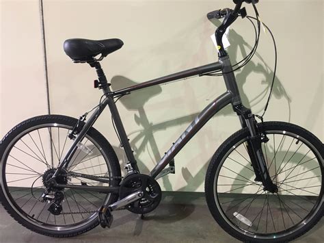 CHARCOAL GIANT SEDONA DX LARGE 24 SPEED FRONT SUSPENSION HYBRID BIKE