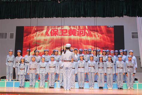 “传承红色 唱响经典”——我校初一年级举行纪念“一二九”运动83周年主题红歌会-北京外国语大学附属外国语学校