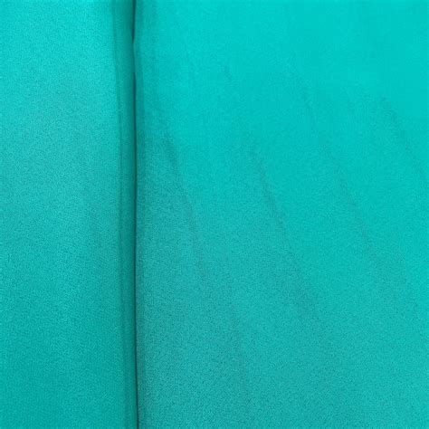 Buy Green Solid Banana Crepe Fabric Online – TradeUNO Fabrics