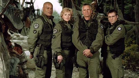 Stargate SG-1 HD Wallpaper: Legendary Team Ready for Action