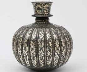 Traditional metal inlay techniques from India