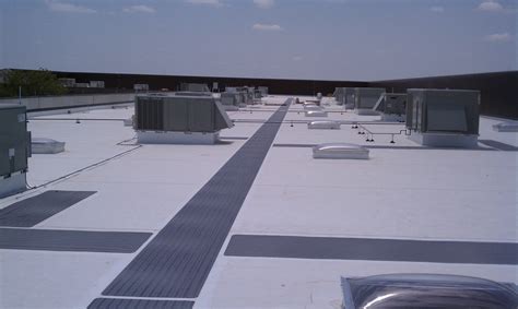 TPO-Flat-roof-with-walk-pads - Progressive Materials