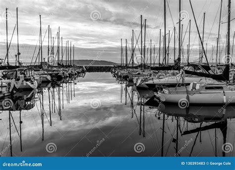 Marina Sunset Reflections editorial stock photo. Image of sunset ...
