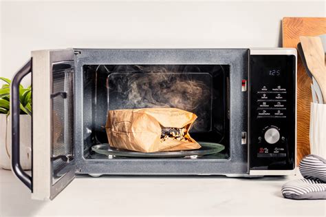 How to Get Burnt Popcorn Smell Out of the Microwave – The Kitchen ...