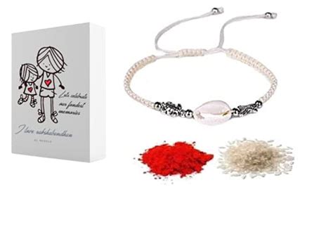 Buy El Regalo Natural Cowrie Bead Shell with Star & Turtle Charm ...