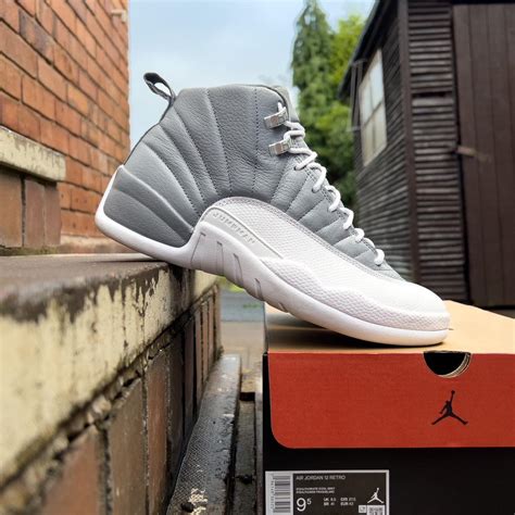 Air Jordan 12 Retro stealth/white/cool... - Depop