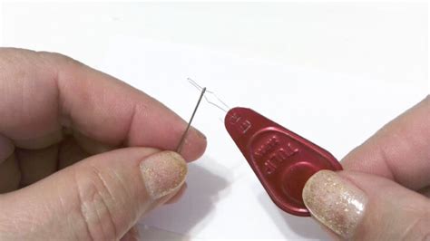 Image result for Changing a Sewing Machine Needle Using a Needle Threader