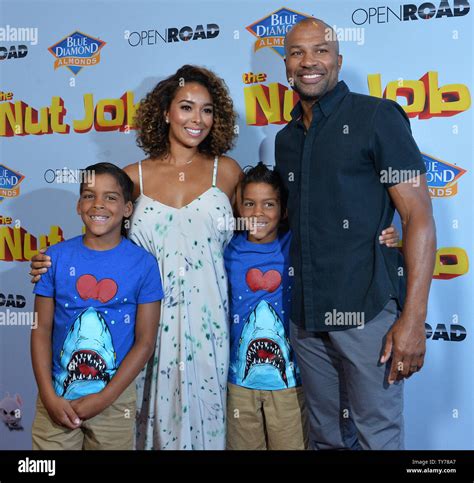 Former NBA player Derek Fisher and TV personality Gloria Govan attend ...