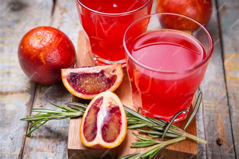 Premium Photo | Juice of red orange fruit