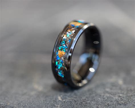 Blue velociraptor dinosaur bone ring and gibeon meteorite ring made ...