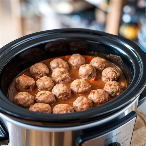 https://cookerdiary.com/wp-content/uploads/2024/12/Meatballs-in-slow-cooker_11zon.webp