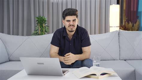 Young man looking at camera with disgust and disgust. 33087315 Stock ...