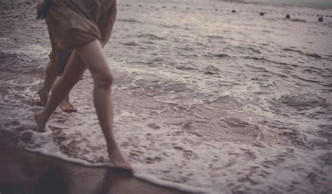 Nude Woman Lying on a Beach · Free Stock Photo