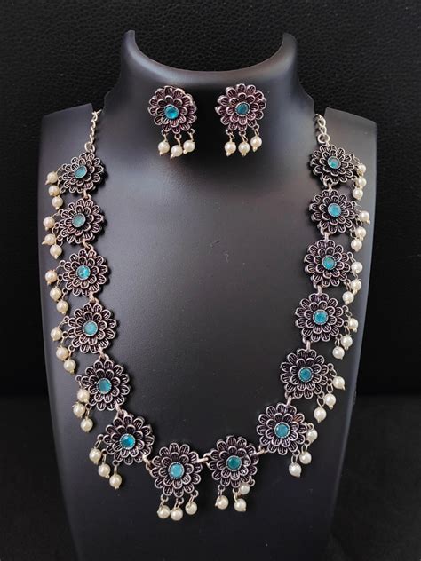 Buy Sky Blue Flower Shaped Oxidised Silver Necklace Set – The Jewelbox