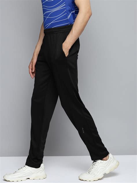 Alcis Men Black Solid Slim Fit Mid-Rise Regular Track Pants ...