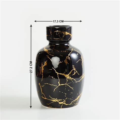 Buy Novelty Ceramic Beaker Vase from Home Centre at just INR 2499.0