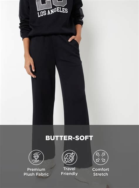 Buy Women Solid Wide Leg Buttersoft Sports Track Pants Online at just ...