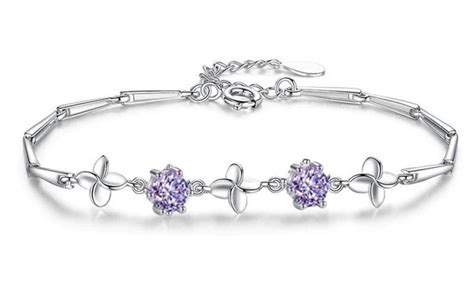 Latest Stylish Silver Plated Cubic Zirconia Clover Shaper Charm Bracel ...
