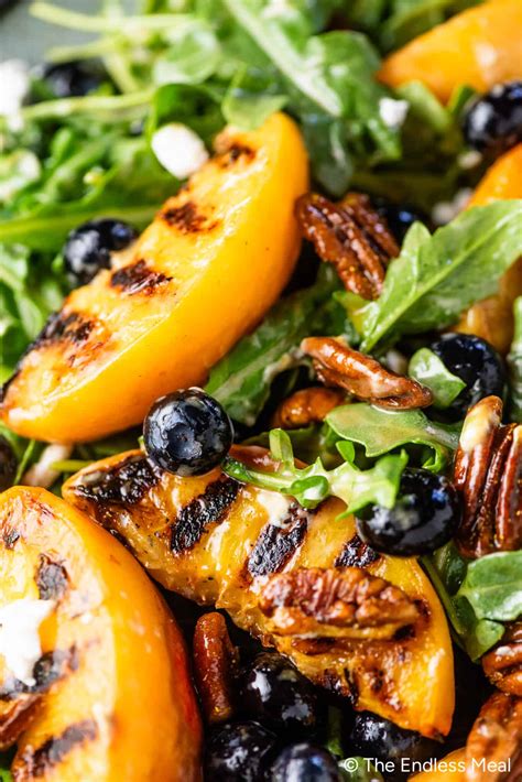 Grilled Peach Salad with Curry Pecans & Honey Vinaigrette