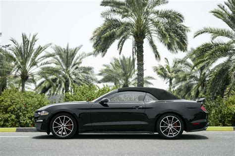 Rent Ford Mustang Black in Dubai - Convertible - Octane.Rent