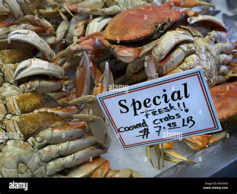 Freshly cooked Dungeness crab on sale with dollar price tag at Monterey ...