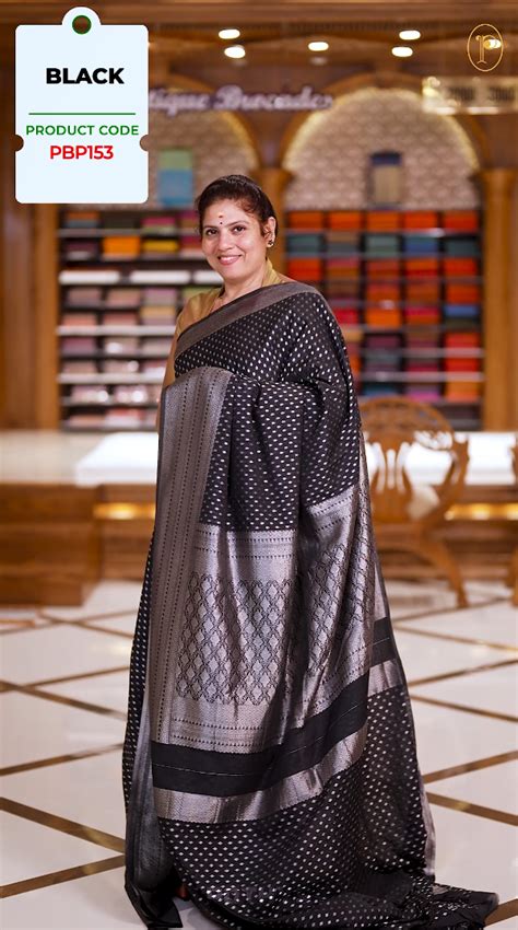 Black colour Semi Banaras georgette saree adorned with delicate silver