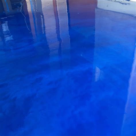 blue metallic epoxy garage floor - Destiny Gunther