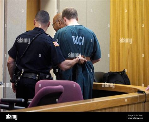 Defendant Liam McAtasney is led away after his is sentencing in ...