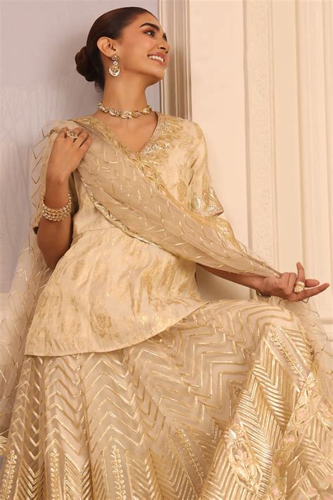 Buy Beige Embroidered Peplum Lehenga Set Online at Biba India