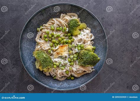 Healthy Baked Green Spaghetti Pasta with Feta Cheese Stock Image ...