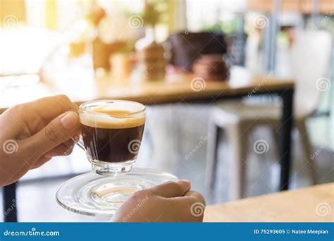 Woman Hand Holding Hot Espresso Shot at Coffee Shop Stock Image - Image ...