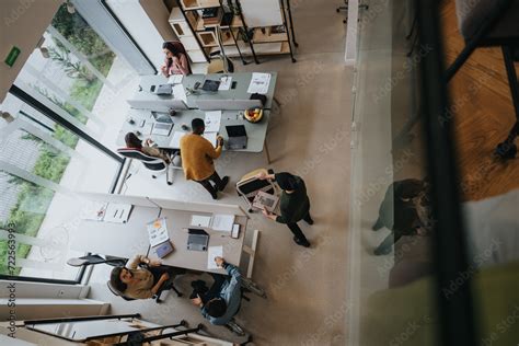 Elevated view of a busy open plan office.