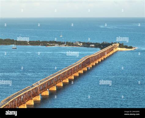 The old Bahia Honda Railroad Bridge with the new Bahia Honda Bridge on the background, Florida ...