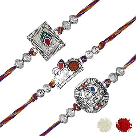Buy eCraftIndia Set of 3 Om, Krishna with Peacock Feather, Ganesha ...