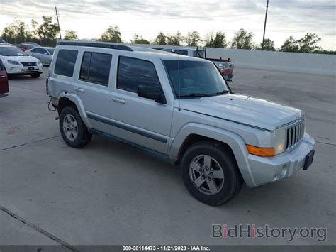 Report 1J8HG48K38C205715 JEEP COMMANDER 2008 Silver Gasoline - price ...