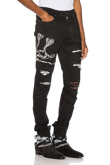 Amiri Snake Patch Jean in Black | FWRD