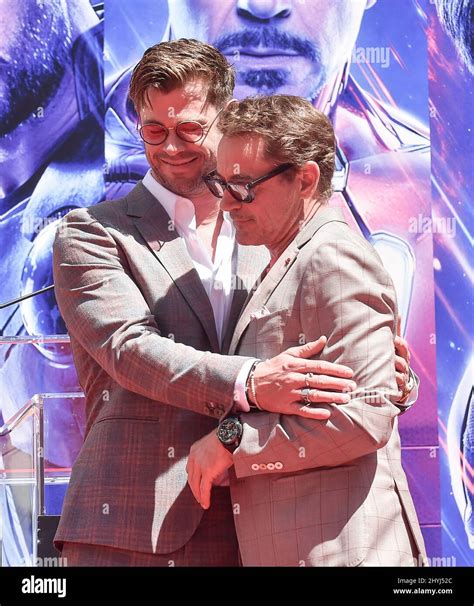 Chris Hemsworth and Robert Downey Jr. at the handprint ceremony for ...