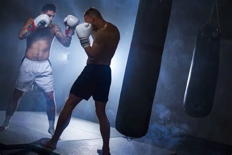 Two Men Boxing Stock Image 的图像结果