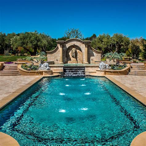 classic pool with a lion wall fountain | Swimming pool pictures ...