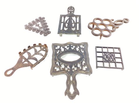 Lot - (6) Antique Cast Iron Trivets