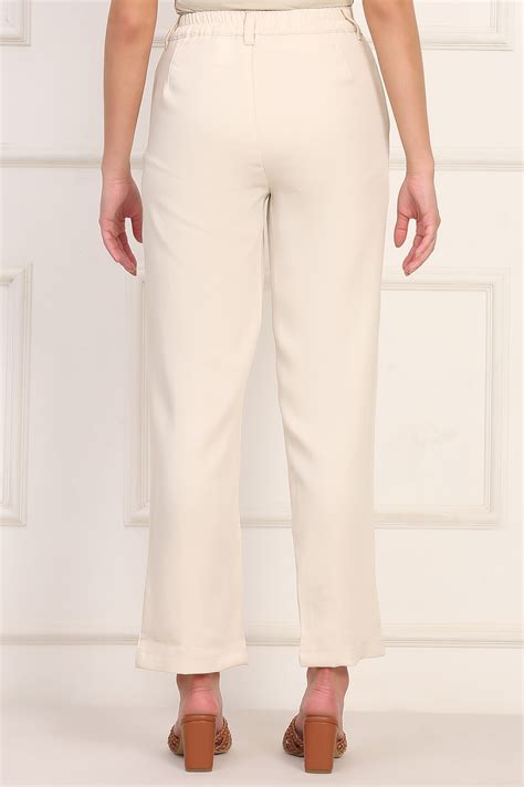 Buy Elleven Women's Beige Solid Straight Woven Pant Pant with YKK ...