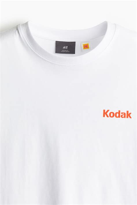 Men’s White/Kodak Loose Fit T-shirt | H&M IN