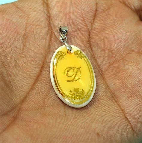 Alphabet D Oval Shaped Shell Pendant – beadsnfashion