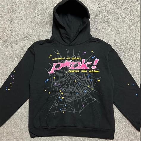 Black and pink spider hoodie only worn a couple... - Depop