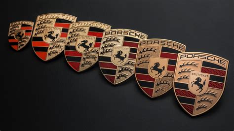 Spot the difference: Porsche has a fancy new badge design | Top Gear