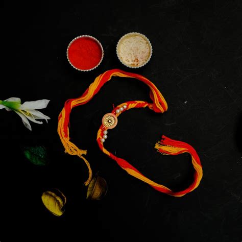 Send Elegant Artisan Rakhi with Soan Papdi Online