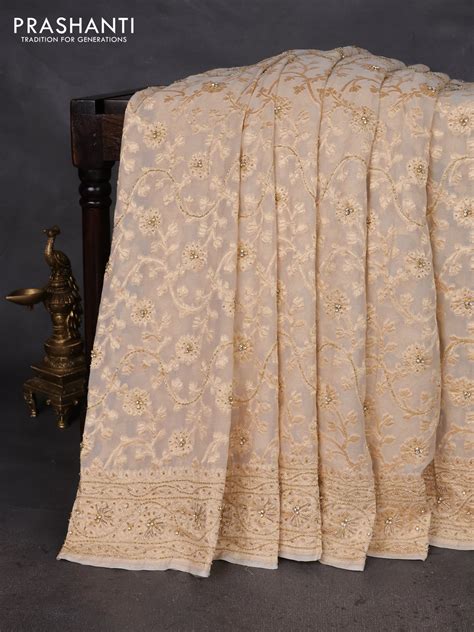 Banarasi georgette saree off white with allover jaal weaves & stone wo ...