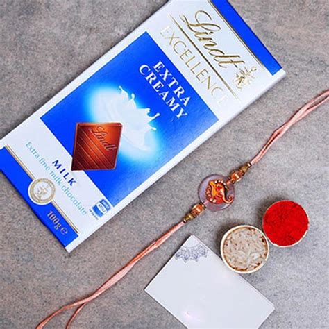 Send Divine Ganesha Rakhi And Lindt Chocolate Online